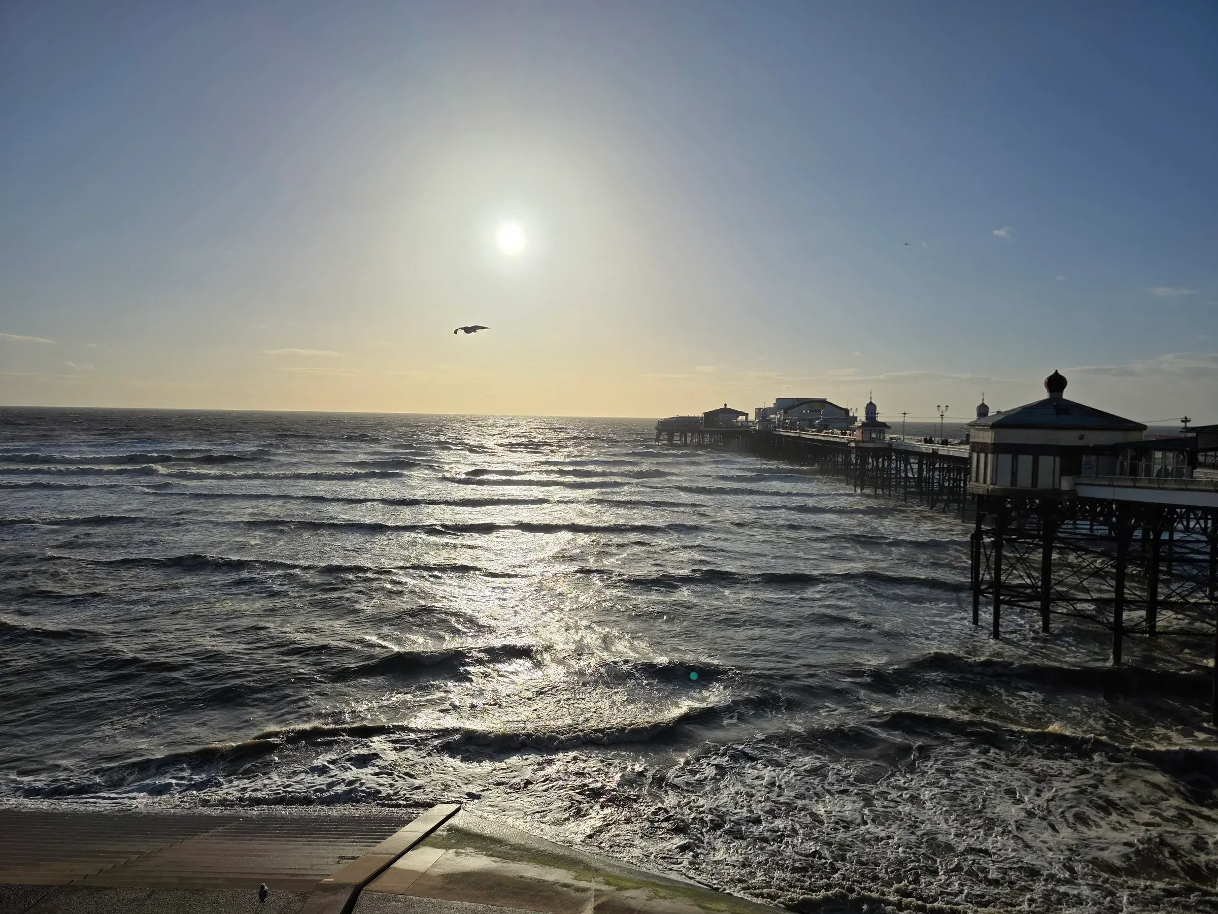 North Pier stretching into a bright and lively Irish Sea
